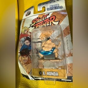 Brand NEW, never opened, original Street Fighter “E. Honda” figurine😍